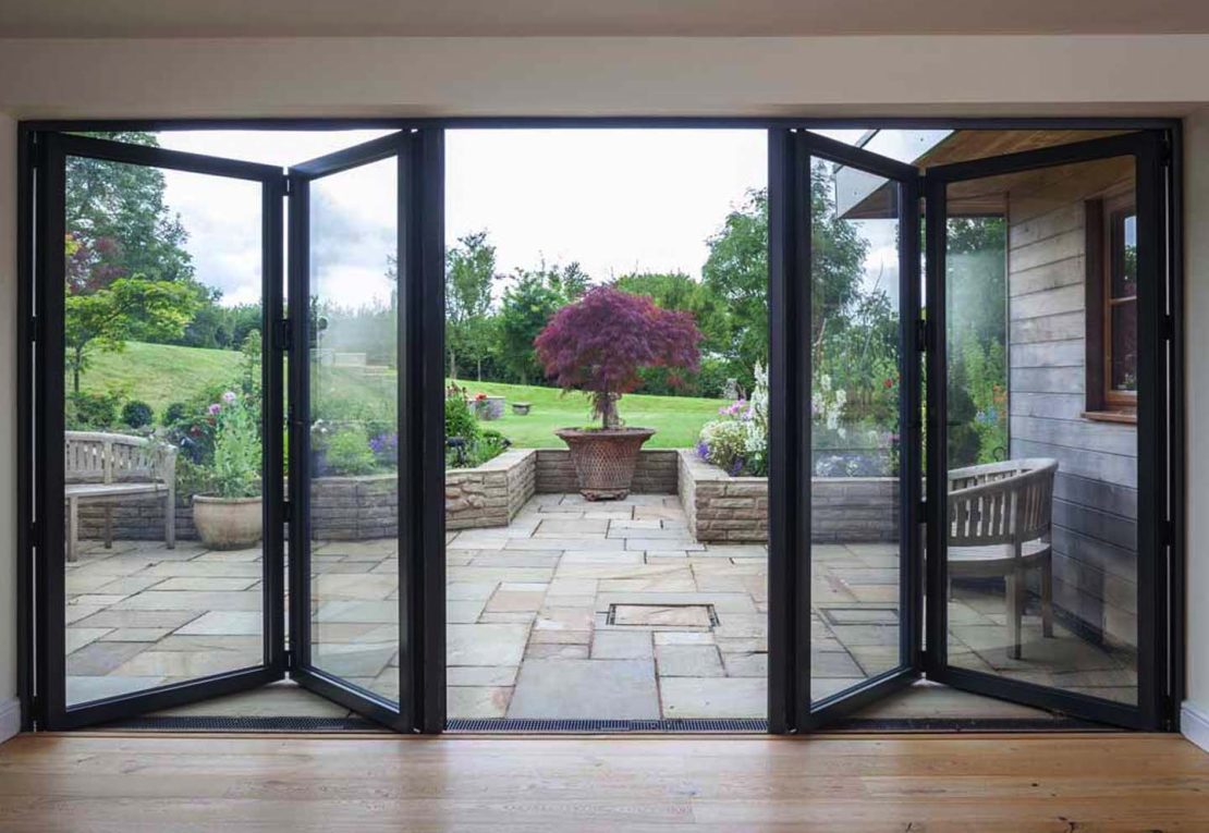Aluco expanse double opening bifold door with 4 panes